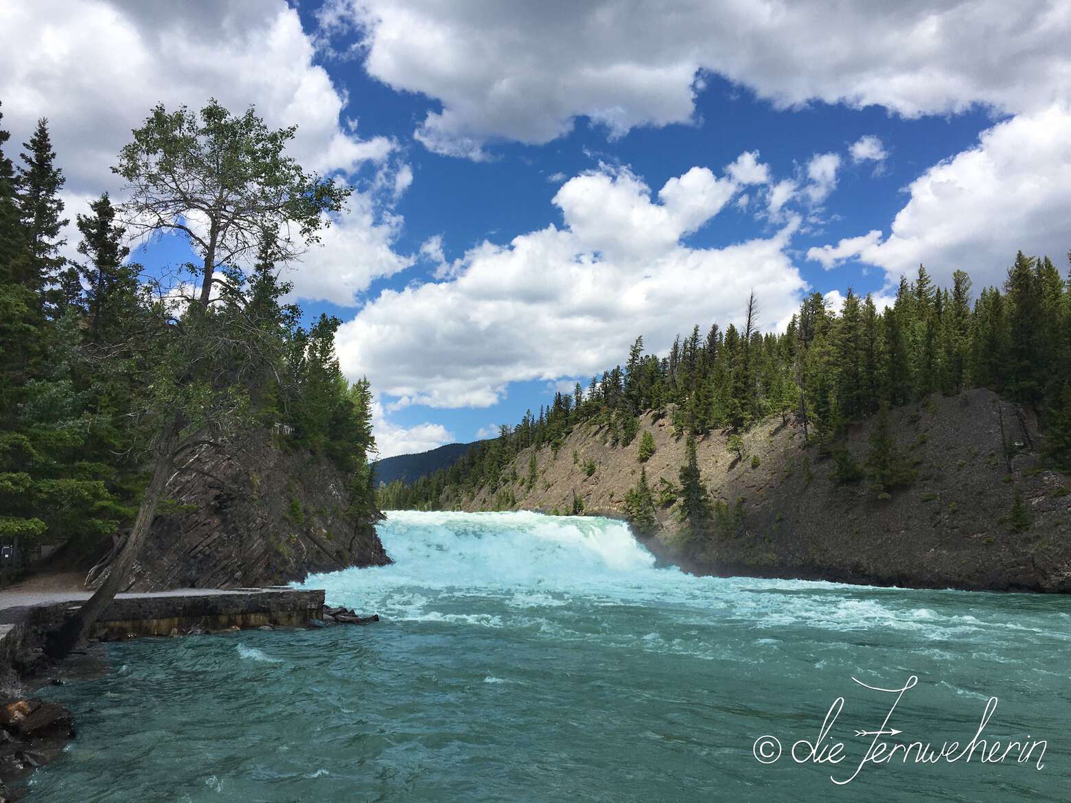 The lower viewpoint at Bow Falls in the town of Banff during the summer.