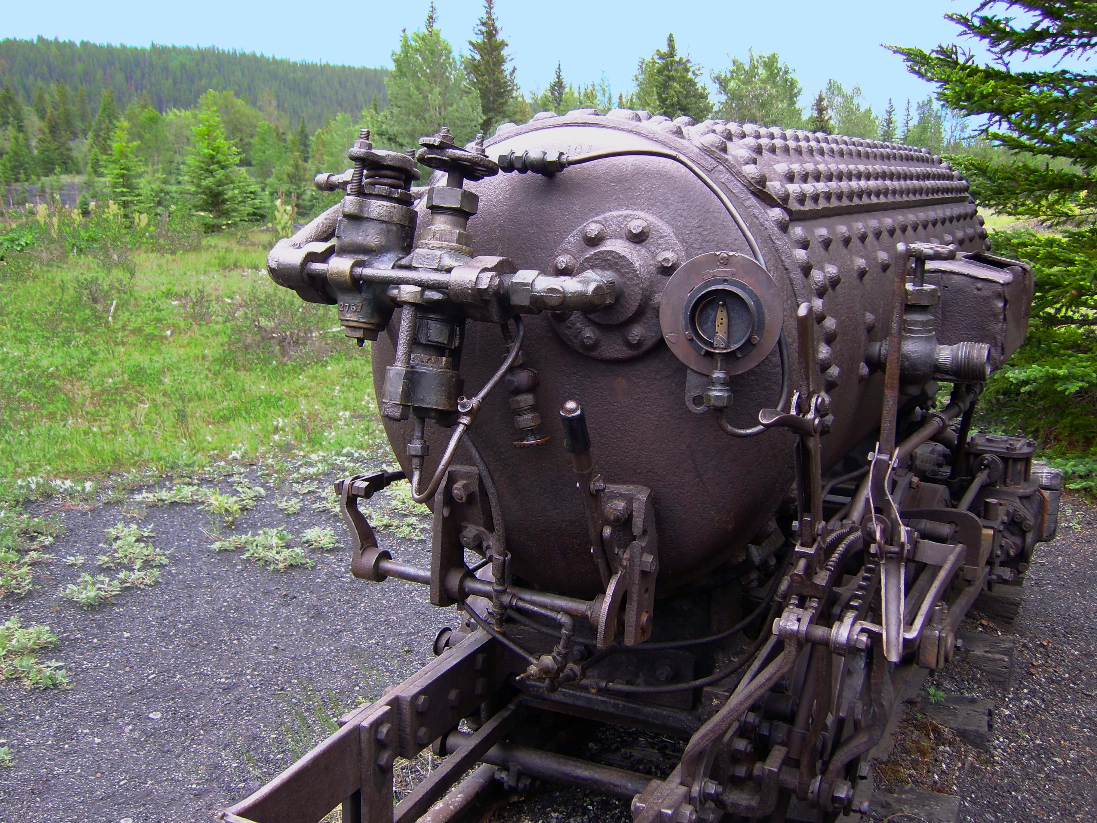 An abandoned locomotive sits in a clearing at Bankhead ghost town in Banff National Park.