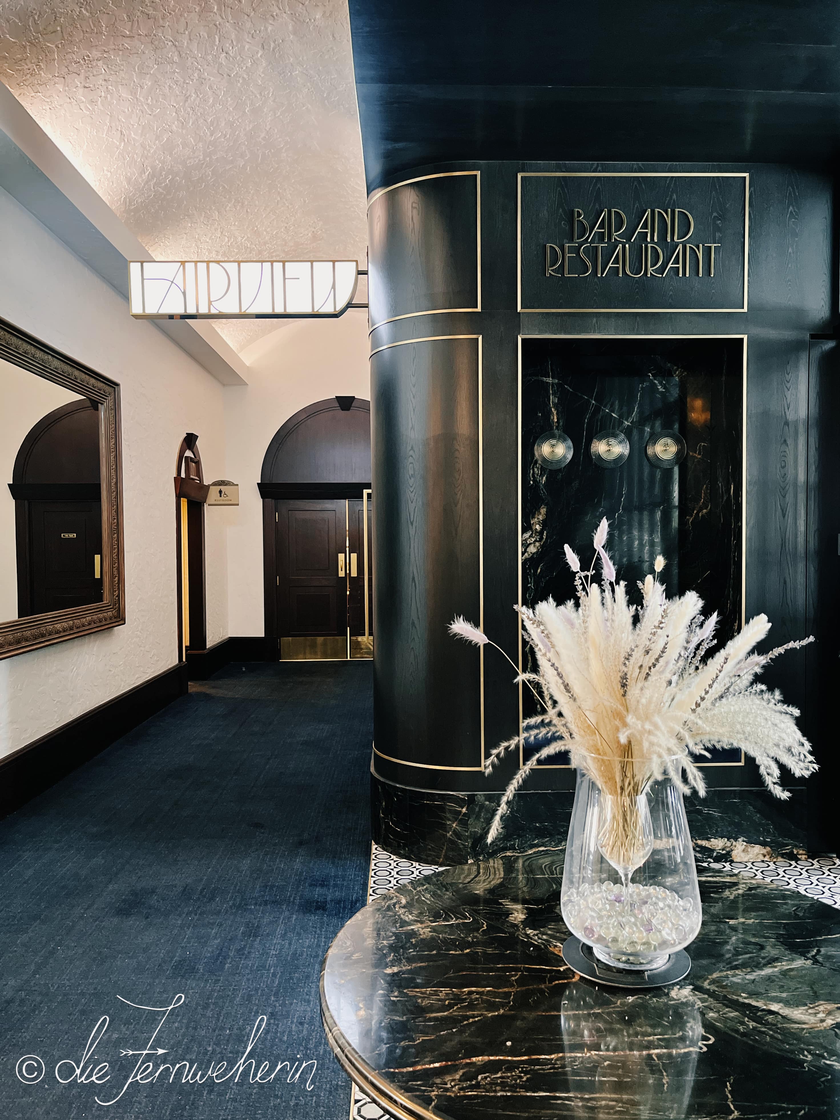 The entrance to Fairview Bar & Restaurant, located in the Fairmont Chateau Lake Louise in Banff National Park.