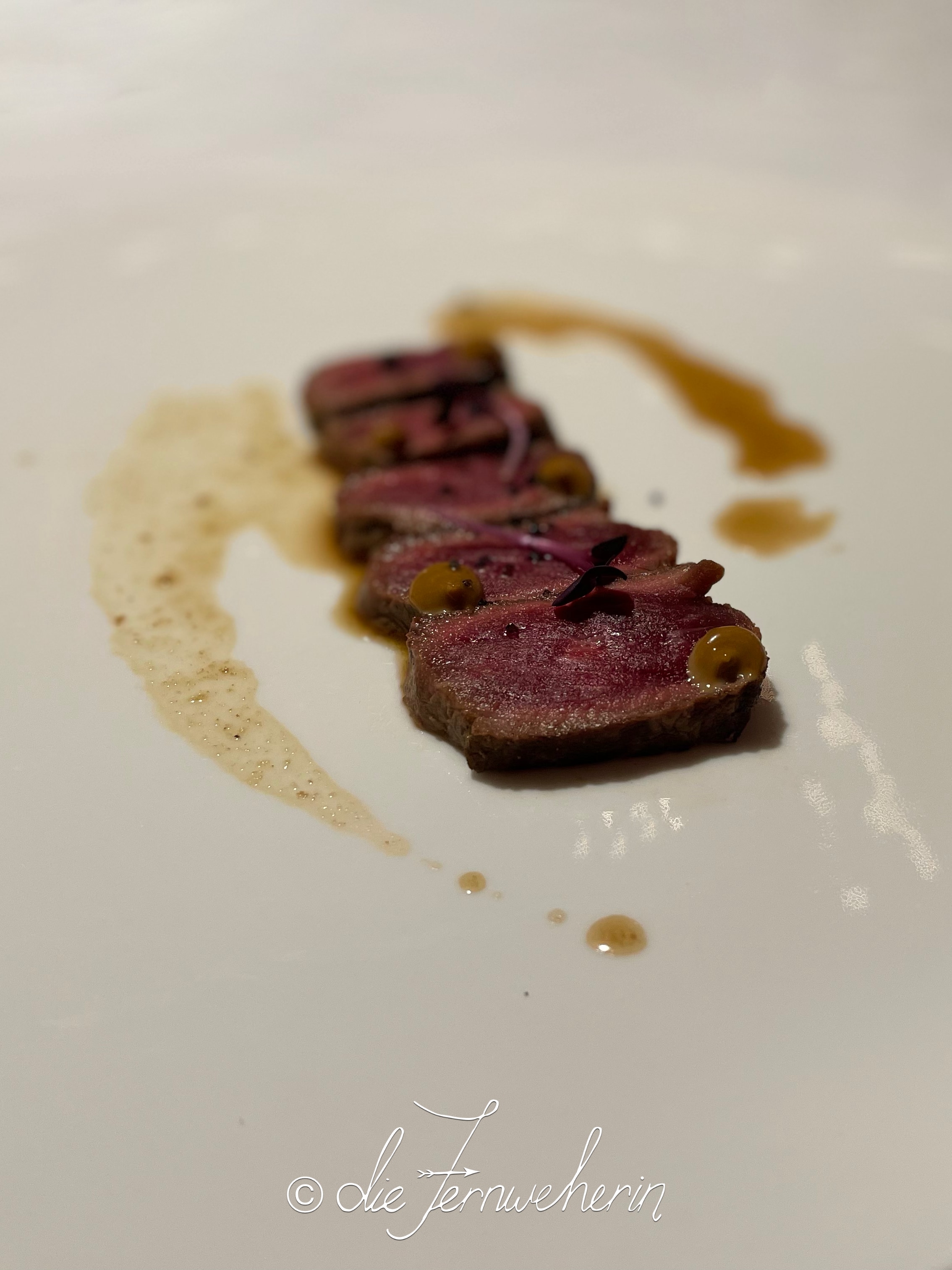 The smoked & shoyu-marinated Bison Tataki at the Post Hotel Dining Room.